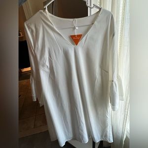 White tunics dress with bell sleeve with tags. Size large. From Amazon.